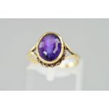 A MODERN AMETHYST SINGLE STONE RING, oval amethyst measuring approximately 10mm x 8mm, ring size