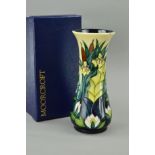 A BOXED MOORCROFT POTTERY VASE, 'Lamia' pattern, impressed marks to base, approximate height 21cm (