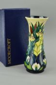 A BOXED MOORCROFT POTTERY VASE, 'Lamia' pattern, impressed marks to base, approximate height 21cm (