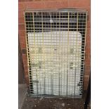 A FOLDING WIRE FRAME DOG CAGE by Rosewood, approximate size 106cm x 64cm