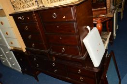 A STAG MINISTRAL DRESSING CHEST and three matching bedside chests (4)