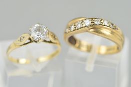 TWO 9CT GOLD DRESS RINGS, the first a single stone cubic zirconia with cubic zirconia accents to the