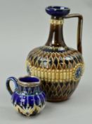 A ROYAL DOULTON STONEWARE EWER, incised and raised decoration in blue, brown and cream glazes,