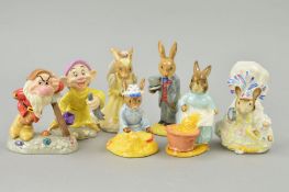 SEVEN ROYAL DOULTON AND BESWICK FIGURES, to include two Doulton Snow White figures 'Irresistibly