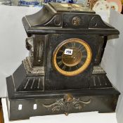 A LATE VICTORIAN BLACK SLATE MANTEL CLOCK OF ARCHITECTURAL FORM, black and gilt dial with Roman