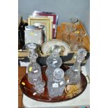 FOUR CUT GLASS DECANTERS, together with cut glass vases, bowl, picture frames, twin handled tray,