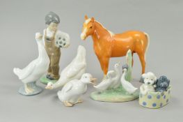 A GROUP OF SIX NAO FIGURES, to include ducks, boy with football, basket with dogs etc and a