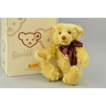 A BOXED STEIFF CLASSIC MILLENIUM TEDDY BEAR, blond mohair, No 003523, with bow, jointed limbs,