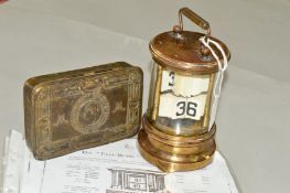 A CHRONOS TICKET CLOCK, unmarked, possibly Ever Ready, approximate height to top of handle 16cm,