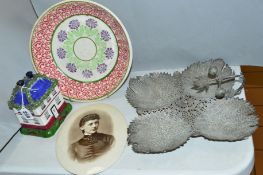 A POTTERY COTTAGE MONEY BOX (restored), a transfer printed oval plaque, a sponge decorated bowl