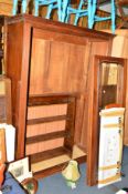 A VICTORIAN WALNUT BEVELLED GLASS TWO DOOR CABINET