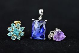 THREE GEM PENDANTS, the first a rectangular faceted sapphire with diamond accent, hallmark for