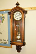 A VICTORIAN MAHOGANY WALL CLOCK, eight day movement, circular dial with Roman numerals,