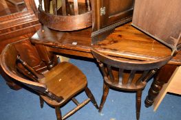 A STAINED PINE TABLE and four chairs (5)