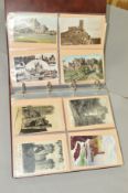 AN ALBUM OF APPROXIMATELY ONE HUNDRED AND FIFTY SIX POSTCARDS, British castles, colour and black and