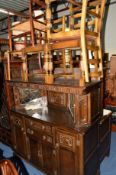 AN OAK COURT CUPBOARD, width 141cm x depth 48cm x height 139cm, together with six various chairs (