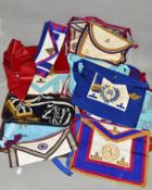 MASONIC INTEREST, a box and two cases of Masonic regalia, mostly aprons (3)