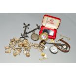 A SELECTION OF JEWELLERY, to include a silver charm bracelet suspending twenty one charms, a