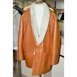 A GENTLEMANS TAN LEATHER JACKET, with sheepskin liner, size large