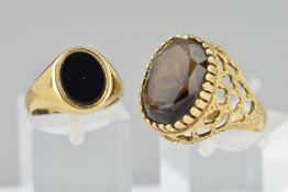 TWO 9CT GOLD GEM SIGNET RINGS, the first set with an oval smokey quartz to the textured openwork