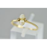 A MID TO LATE 20TH CENTURY PEARL AND DIAMOND DAINTY DRESS RING, ring size N, hallmarked 9ct gold,