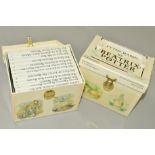 TWO PRESENTATION CASES OF BEATRIX POTTER BOOKS, 'The World of Peter Rabbit' numbered 1-23 (2) (one
