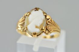 A MID 20TH CENTURY SHELL CAMEO RING, depicting a maiden in profile, ring size O 1/2, partial