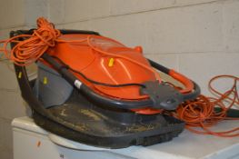 A FLYMO ELECTRIC HOVER LAWN MOWER, a flymo strimmer and a Black & Decker electric strimmer (3)