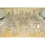 A QUANTITY OF CUT GLASS, to include drinking glasses, decanter, vases and finger bowls etc
