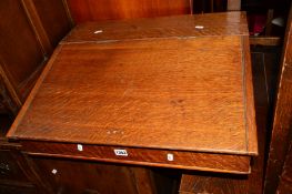 AN OAK TABLE TOP LEDGER DESK with four interior drawers