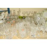 A QUANTITY OF CUT GLASS ETC, to include drinking glasses, vases, decanters and dressing table