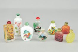 NINE SCENT BOTTLES, to include three of carved floral design, the remaining painted with Oriental