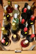 A COLLECTION OF FOUR BOTTLES OF SPIRITS AND THIRTEEN BOTTLES OF FRENCH WINES to include Bells