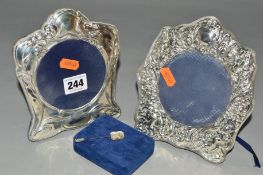 TWO ELIZABETH II SILVER MOUNTED PHOTOGRAPH FRAMES, of late Victorian and Art Nouveau styles,