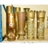SEVEN TRENCH ART SHELL CASES, including a pair with heavily textured bodies embossed with flowers,
