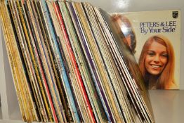 A TRAY OF OVER 70 L.P'S FROM THE 1950'S TO THE 1980'S, artists include The Beatles, Genesis, Pink