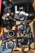 A TRAY OF SLR AND 110 CAMERAS AND EQUIPMENT, these include a Pentax Auto 110, Motorwinder, flash,