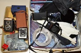 A TRAY AND A CASE OF CAMERA AND PHOTOGRAPHIC EQUIPMENT, including a Voigtlander Briliant, a