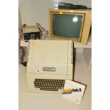 AN APPLE 2 VINTAGE COMPUTER, with monitor and disk 2