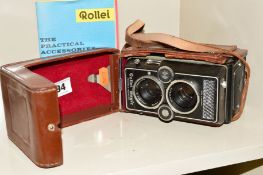A ROLLEI MAGIC TLR CAMERA IN LEATHER CASE