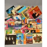 A COLLECTION OF OVER 200 SINGLES AND OVER 30 L.P'S, artists include Elvis Presley, The Beatles, Matt