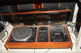 A DYNATRON SRX20 MUSIC CENTRE, with a Garrard 355B turntable and a pair of LS1128CR speakers (PAT