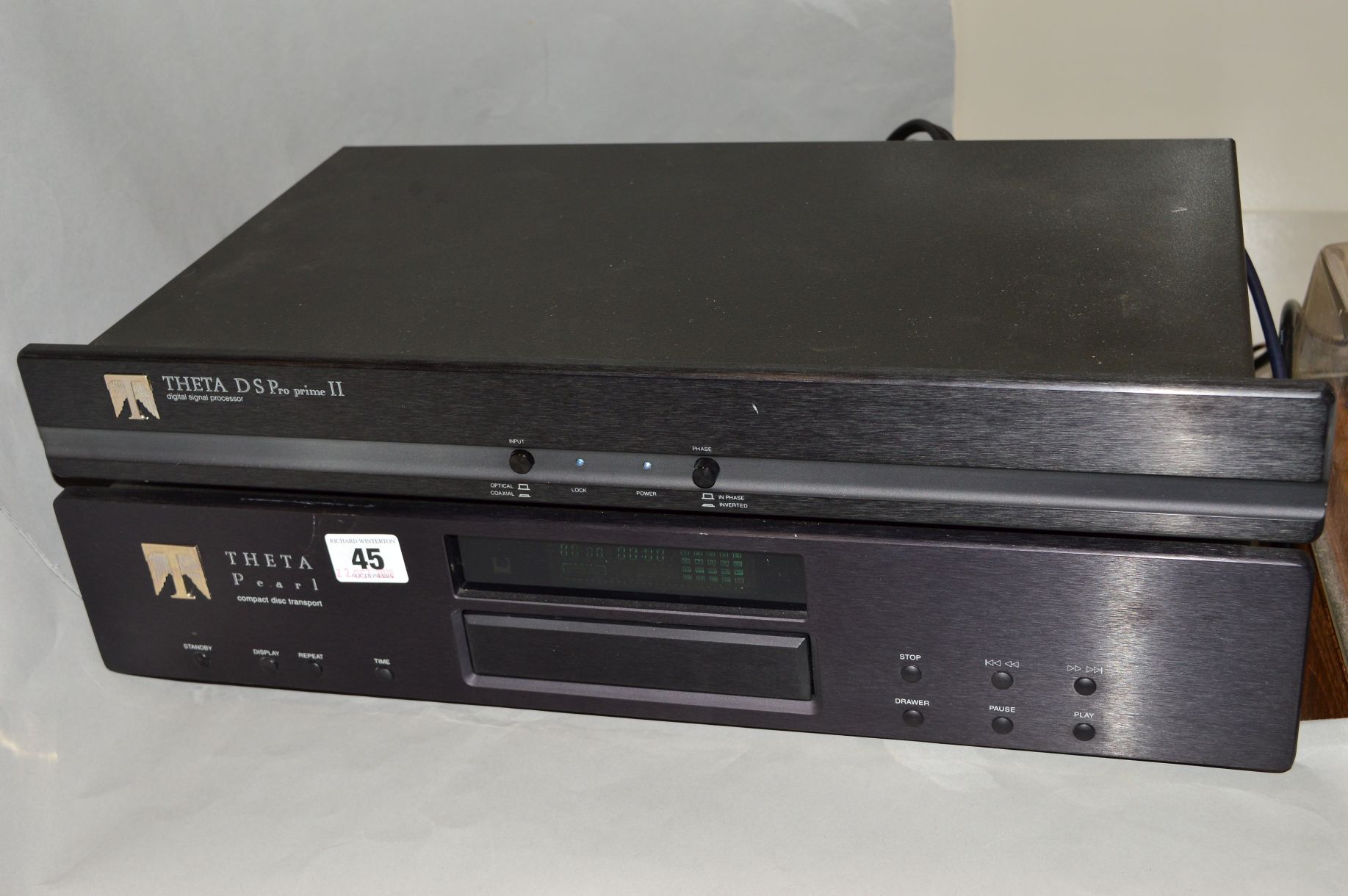 A THETA DS PRO PRIME 2 DIGITAL PROCESSOR AND A PEARL COMPACT DISC TRANSPORT, with remote, both in