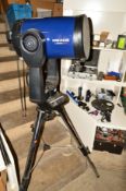 A MEADE LX200GPS TELESCOPE, on stand along with a quantity of eyepieces, controllers and