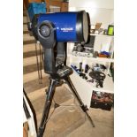 A MEADE LX200GPS TELESCOPE, on stand along with a quantity of eyepieces, controllers and