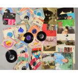 A BOX OF OVER 150 SINGLES FROM THE 1950'S AND 60'S AND 18 L.P'S, artists include The Beatles,