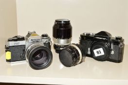 A NIKKORMAT FTN BLACK, a Nikon FE2 fitted with a 50mm f1.8, a Nikkor-H Auto 28mm f3.5 and a Nikkor-Q
