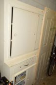 A CREAM PAINTED PINE KITCHEN UNIT with two drawers and sliding cupboard doors to top and base,