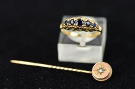 A 9CT GOLD SAPPHIRE RING AND A DIAMOND STICKPIN, the ring designed as five graduated circular