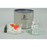 TWO BOXED SWAROVSKI CRYSTAL ORNAMENTS, Santa's Sleigh, with presents and a reindeer (2)